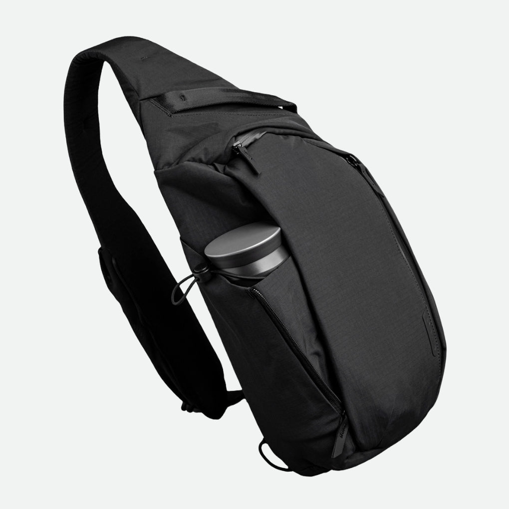 Alpaka Metro Crossbody - Left Shoulder - Black Axoflux - Hero Image